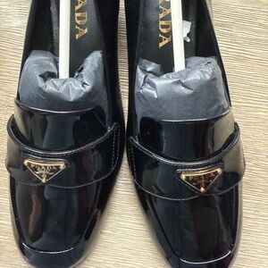 Prada navy small heal women loafer.